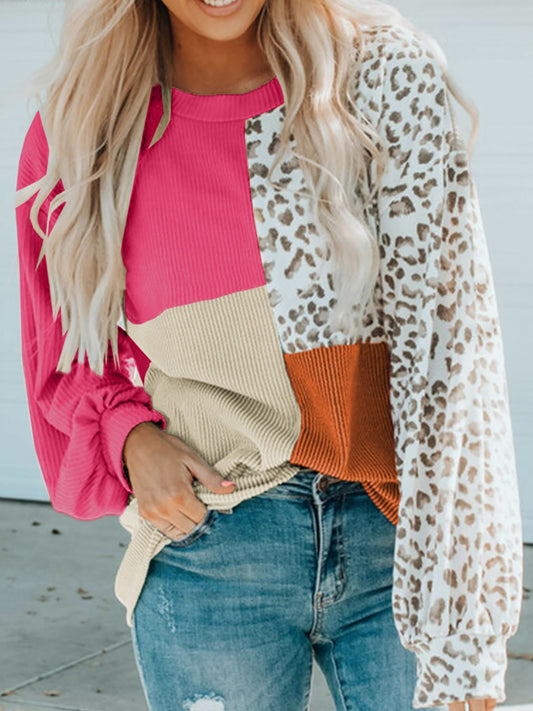 Color Block Leopard Round Neck Sweatshirt featuring vibrant pink, orange, and leopard print for a casual style.