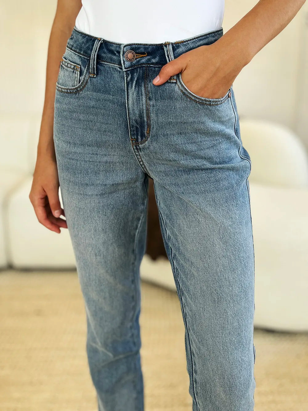 Mid Rise Magic Release Hem Jeans – Classic Structured Fit displayed on a model, showcasing a stylish and versatile denim look.