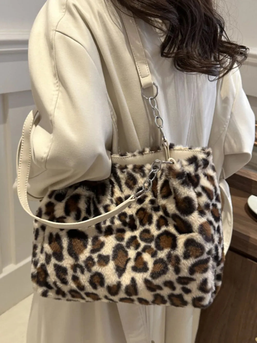 Faux Fur Leopard Shoulder Bag displayed on a model showcasing bold everyday style and chic design.