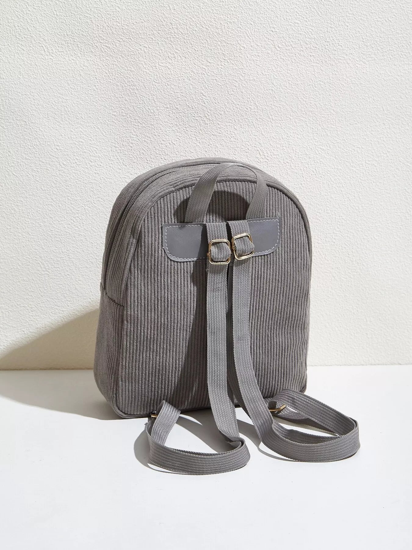 Casual Corduroy Backpack Bag in gray color with adjustable straps for daily urban use.