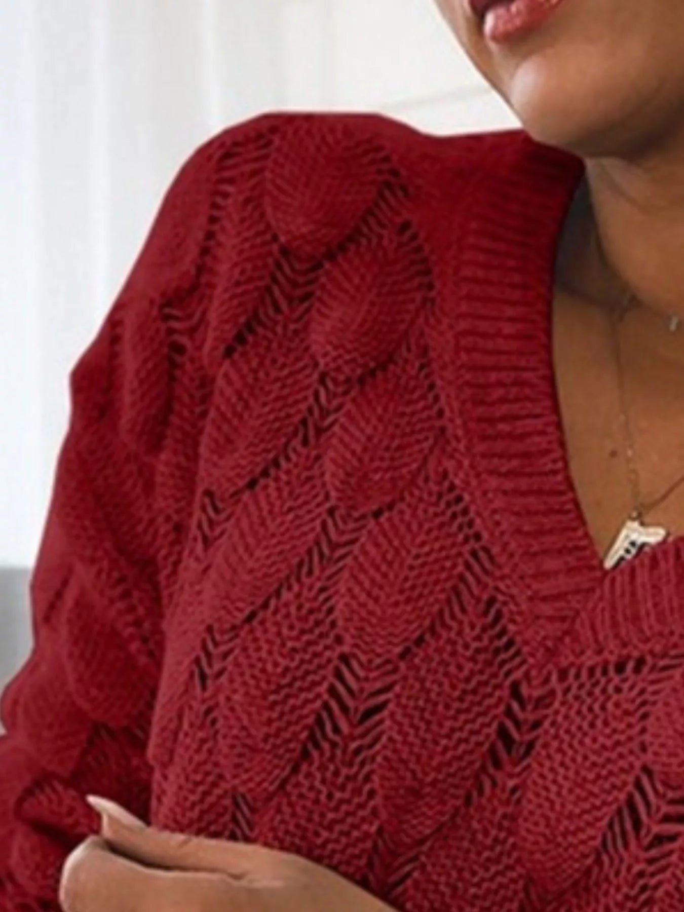 V-Neck Knitted Sweater with openwork design in rich red for effortless everyday style.