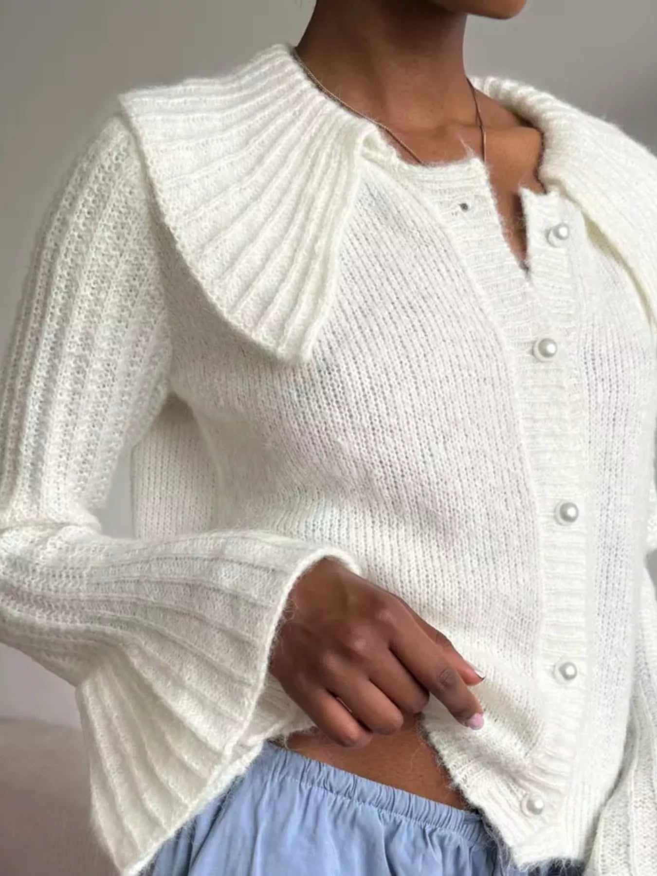 Button Up Flare Sleeve Cardigan in white with stylish buttons and ribbed texture, perfect for casual elegance.