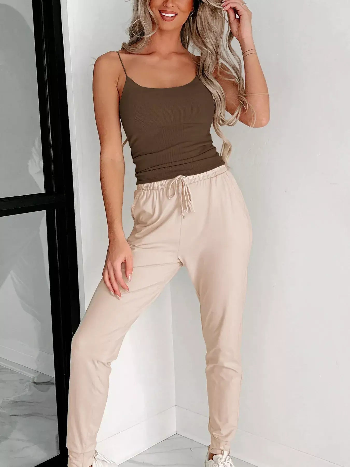 Scoop Neck Cami worn with beige joggers, showcasing a casual yet stylish outfit.