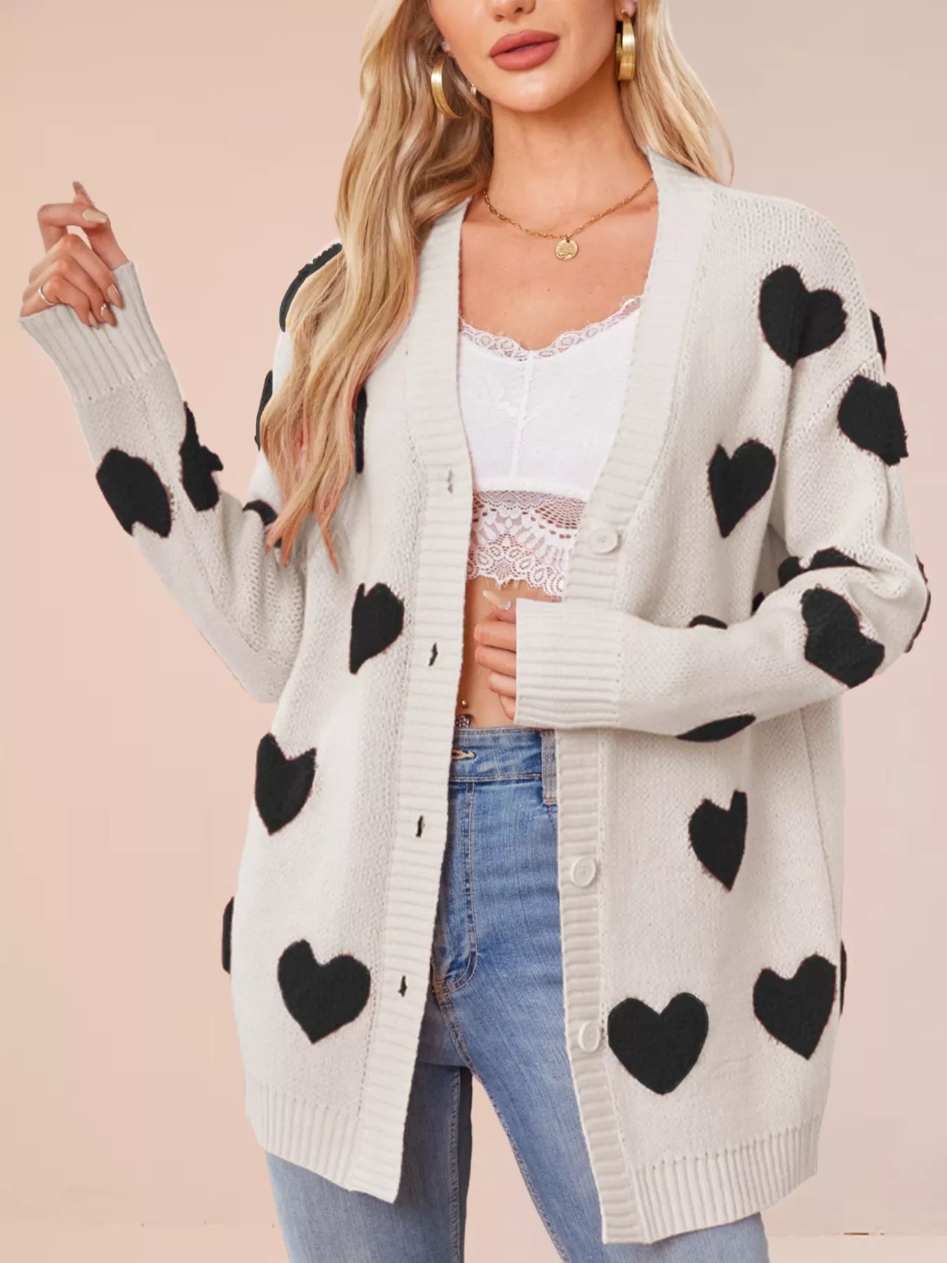 Heart Pattern Knit Button Up Cardigan for Women style with black hearts on a light gray background.