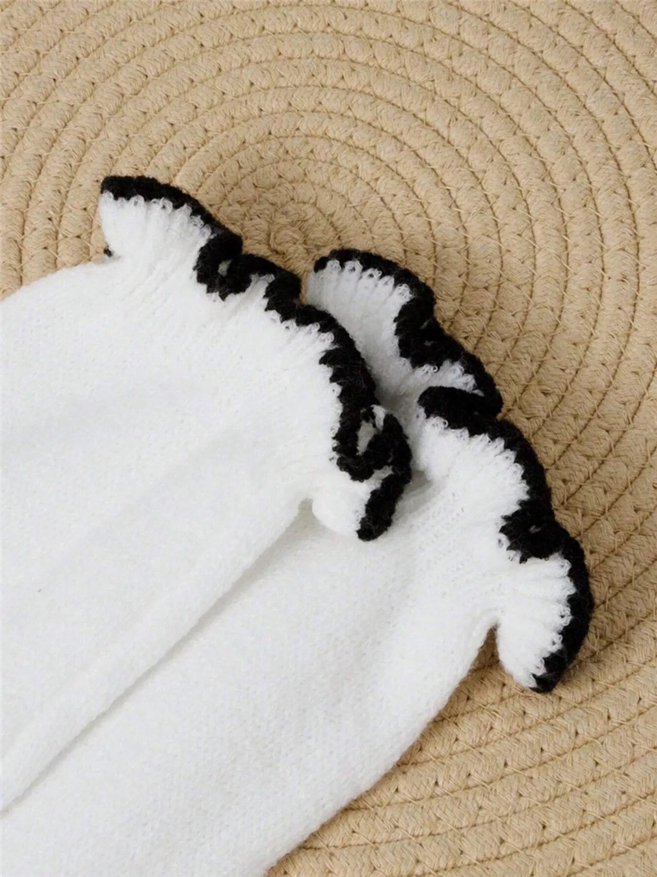 Ruffled Trim Button Front Sweater featuring white socks with black frill detailing on the edges.