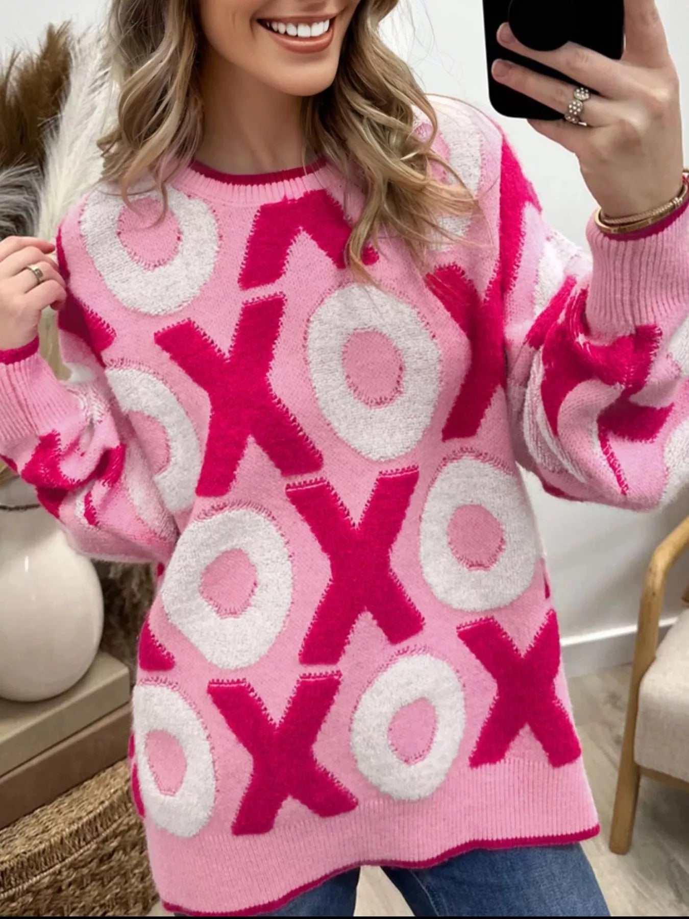 XOXO Pattern Round Neck Sweater in pink with playful XOXO design, perfect for a cute cozy style.