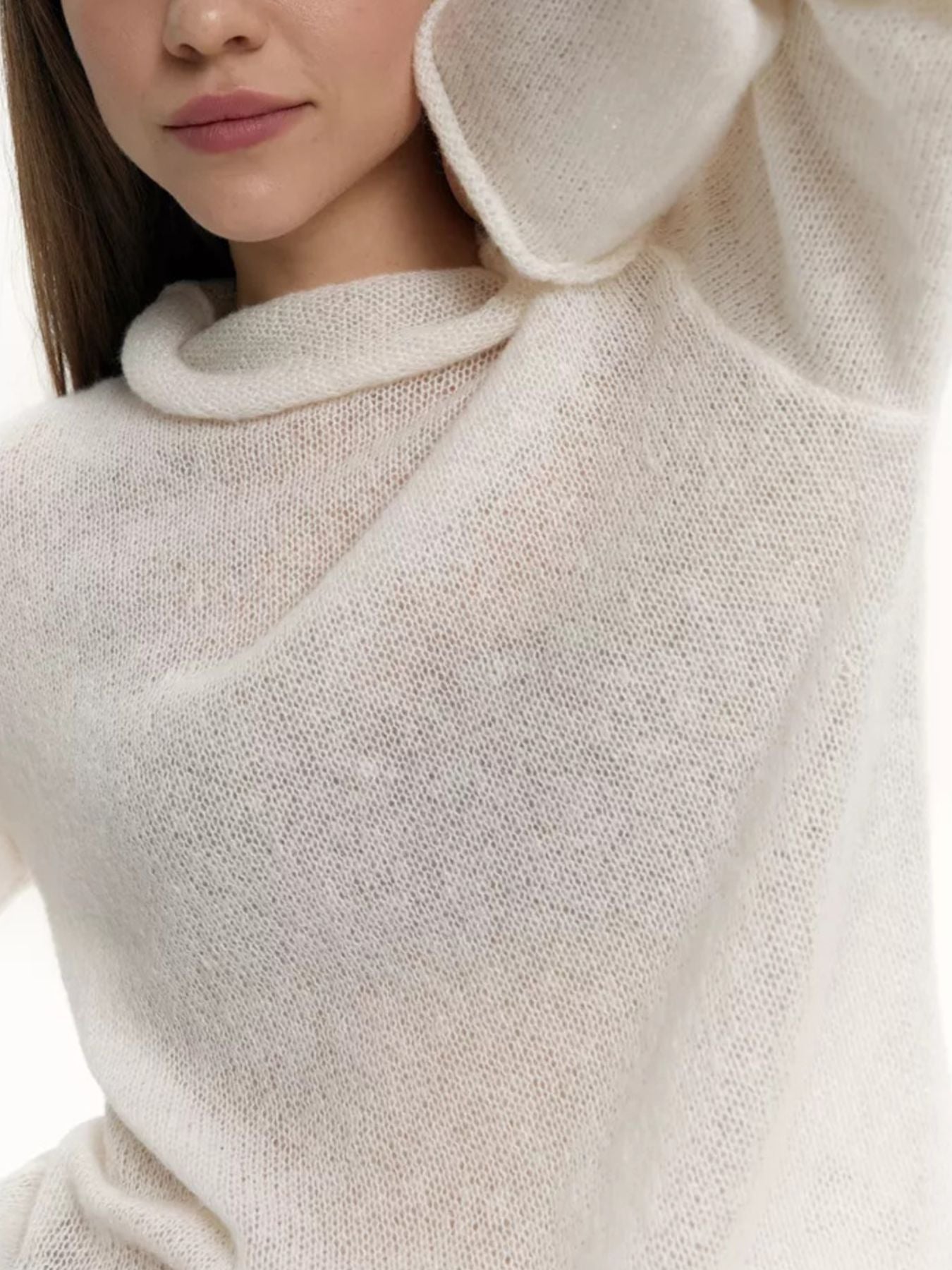 Model wearing a Mock Neck Long Sleeve Sweater in a light color, showcasing a cozy and casual style.