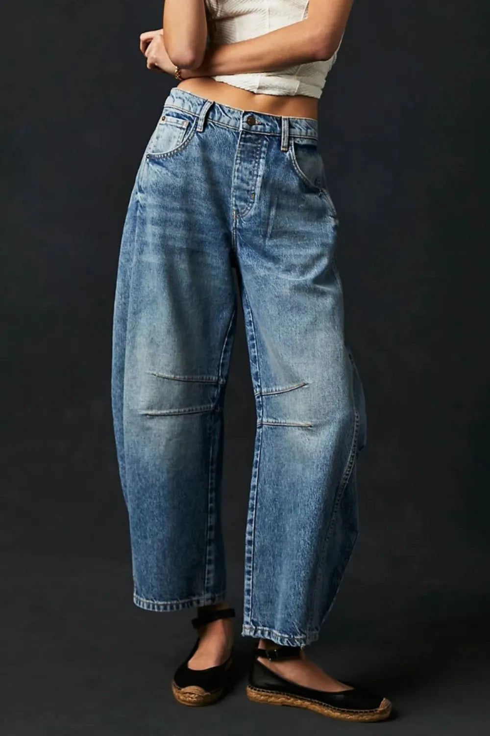 Wide Leg Jeans with Pockets showcasing a casual outfit for everyday style in a faded blue denim.