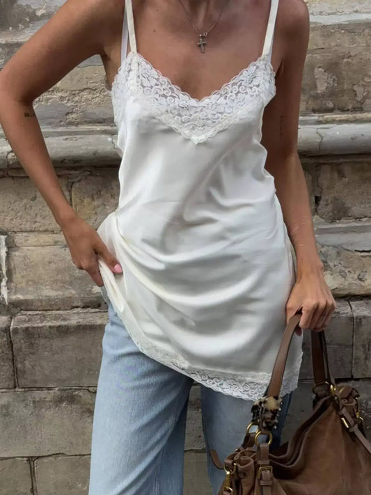 Lace Detail V-Neck Cami in white, styled with casual jeans and handbag for a chic, feminine look.