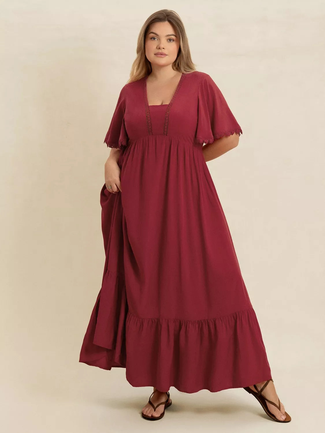 Plus Size Lace Detail Flutter Sleeve Maxi Dress in burgundy with lace accents and flutter sleeves.