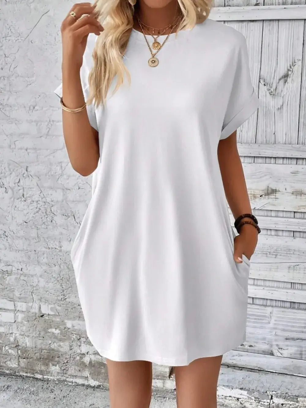 Casual Pocketed Round Neck Short Sleeve Dress in white, featuring practical pockets and a relaxed fit.