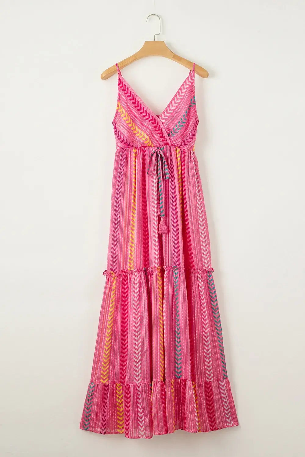 Printed Surplice Maxi Cami Dress on a hanger, featuring vibrant colors and a flowy maxi length.