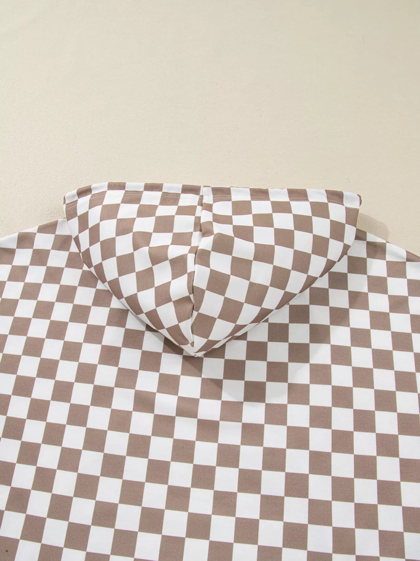 Checkered Pattern Oversized Drawstring Hoodie showcasing its hood and checkered design on a neutral background.