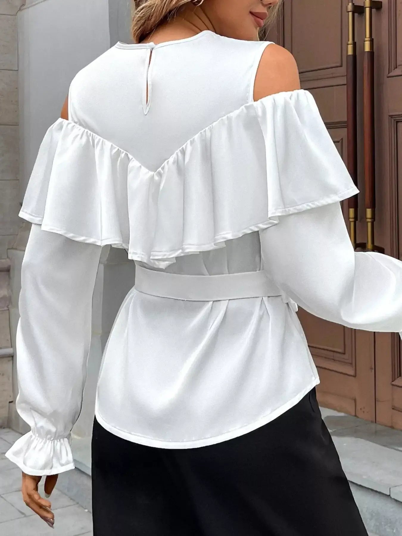 Ruffled Cold Shoulder Flounce Sleeve Blouse showcasing elegant ruffles and flounce sleeves in white fabric.