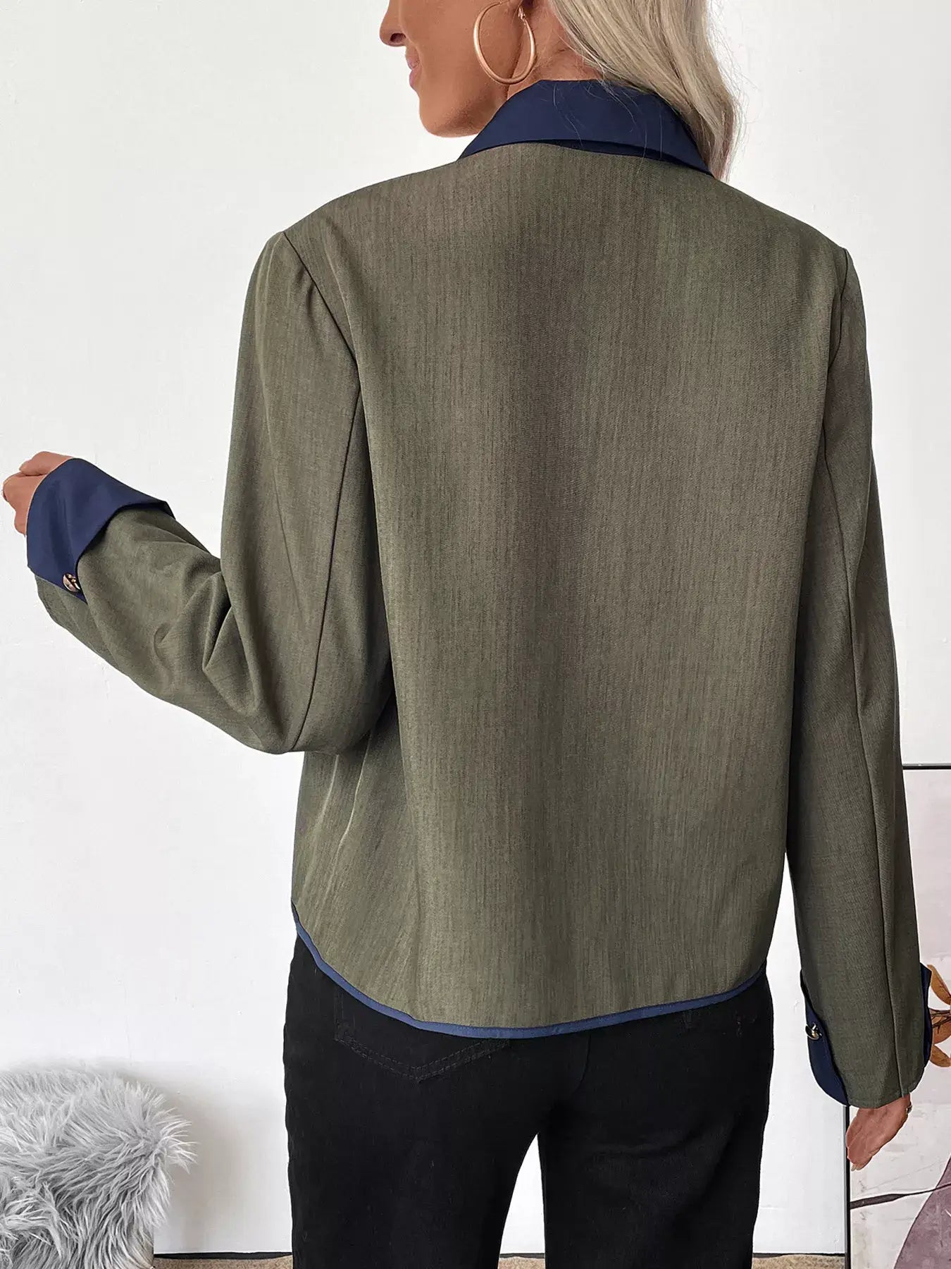 Back view of a stylish Contrast Trim Button-Up Jacket for Women, showcasing tailored fit and contrasting collar.