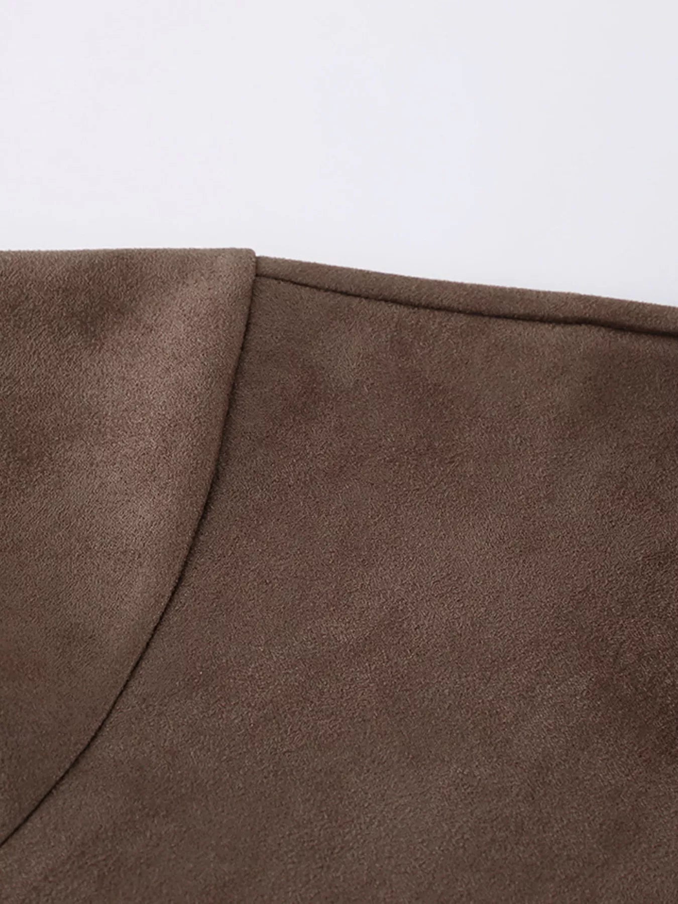 Close-up view of the collar and fabric of the Zip-Up Dropped Shoulder Jacket in brown color.