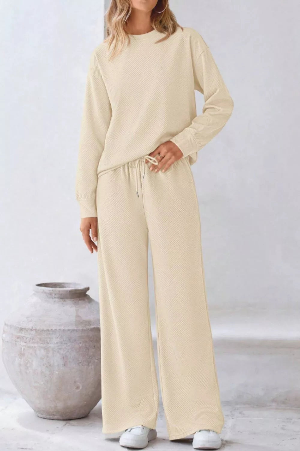 Round Neck Long Sleeve Top and Pants Set in a chic cream color, perfect for casual outings and lounging.