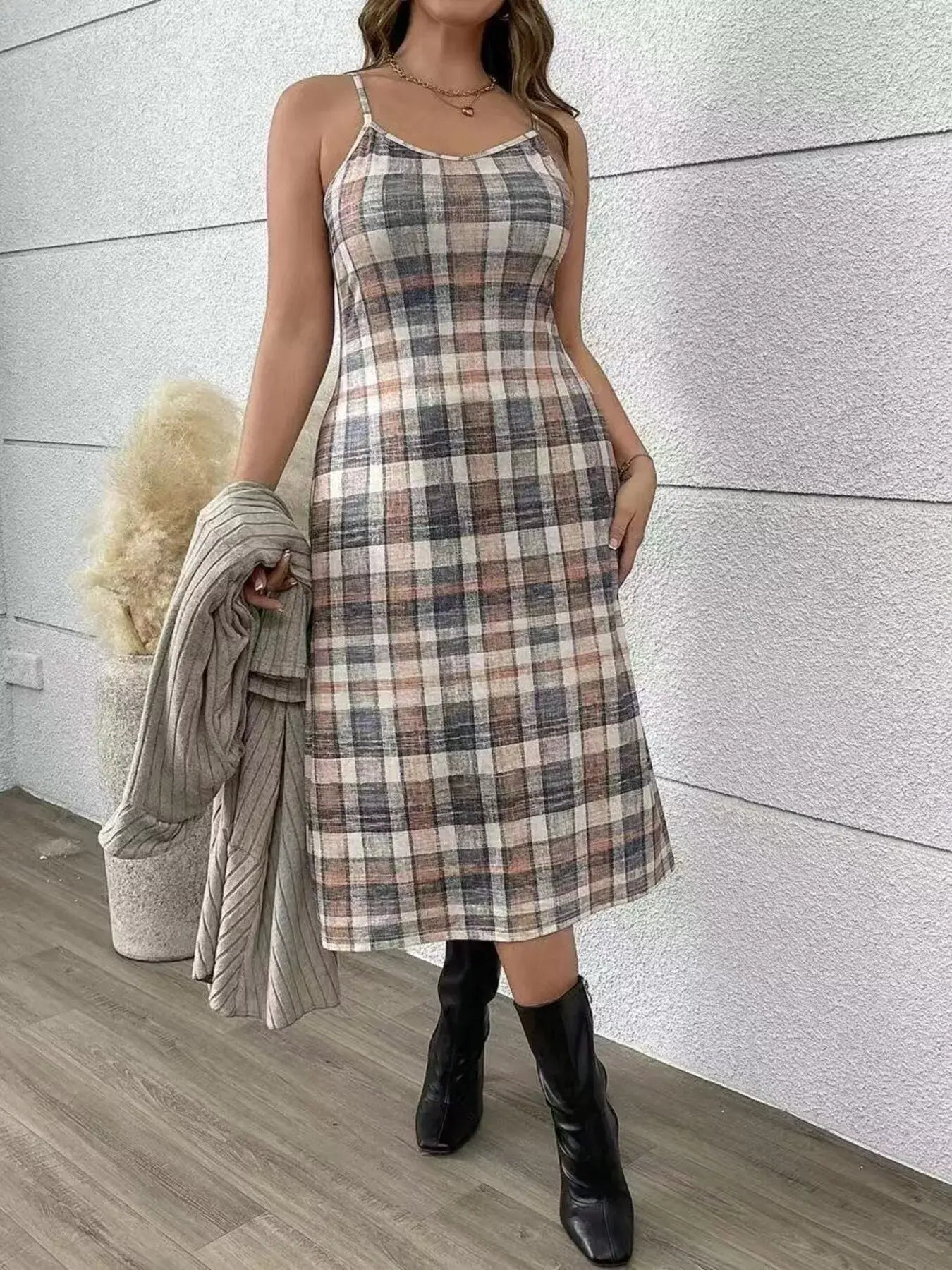 Plaid Cami Dress and Ribbed Cardigan Set worn by a model, showcasing elegant plaid print and stylish layers.
