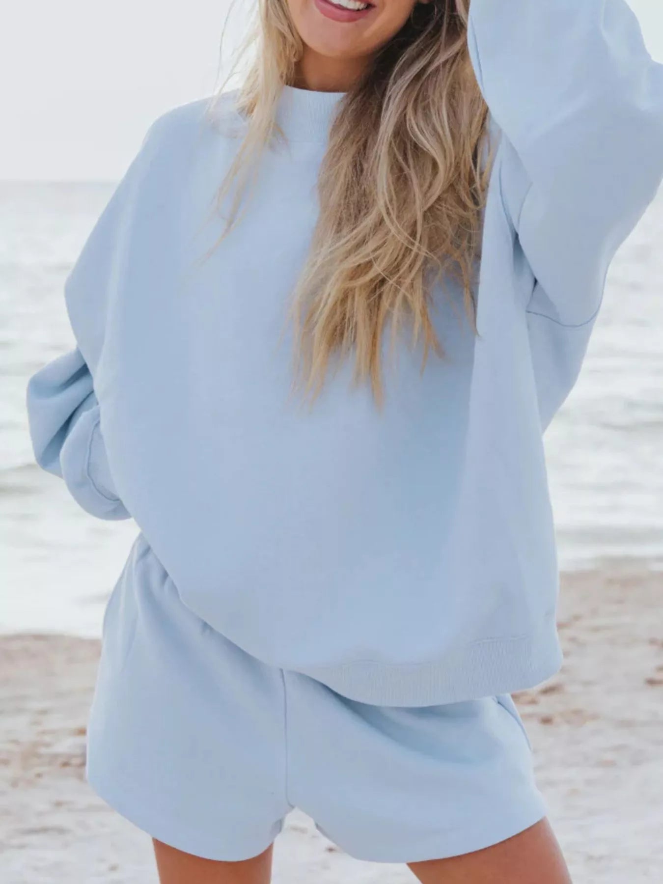 Relaxed Fit Round Neck Sweatshirt and Shorts Set in blue, perfect for casual outdoor wear.