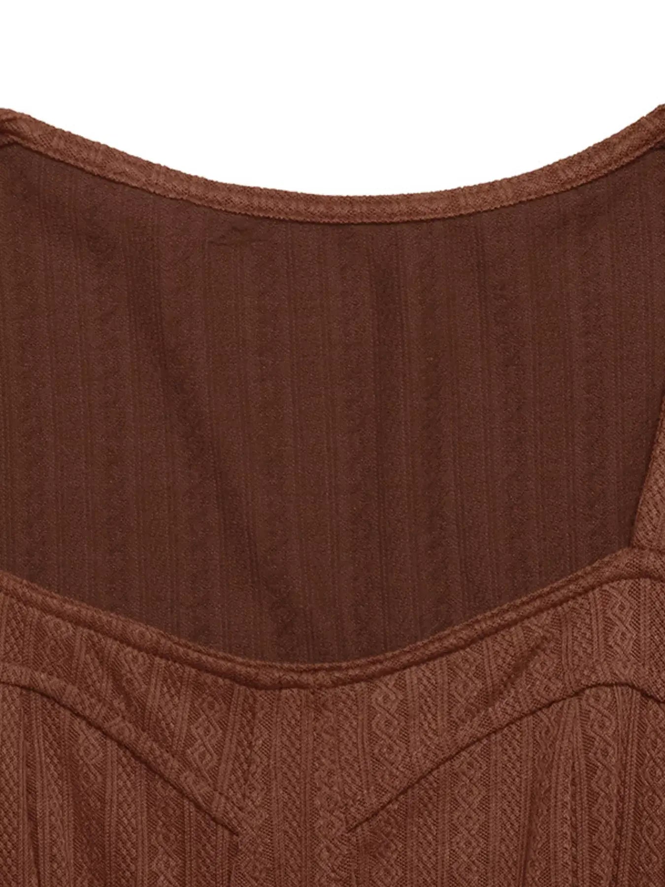 Detail of Ruffled Hem Long Sleeve Knit Dress for Women showing textured brown fabric and neckline.