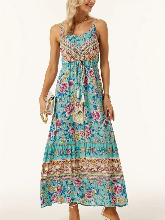 Model wearing a Printed Scoop Neck Midi Cami Dress with floral print and a flowing silhouette.