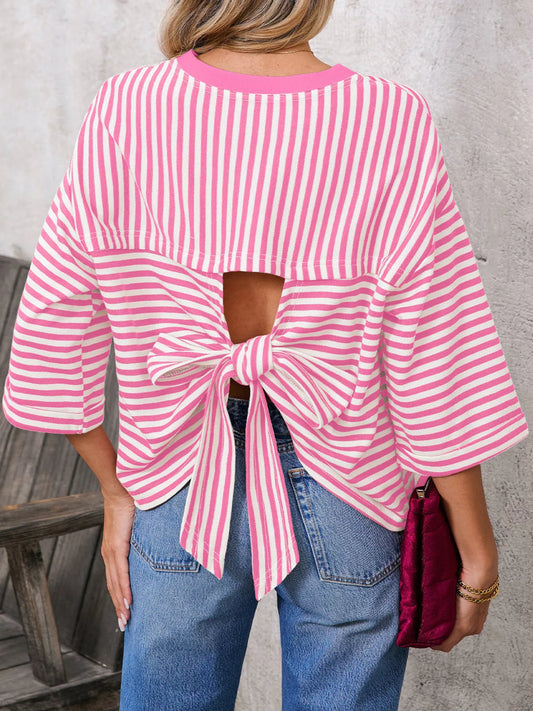 Striped Back Bow Tie T-Shirt showcasing oversized design with a bow tie back detail and pink stripes.