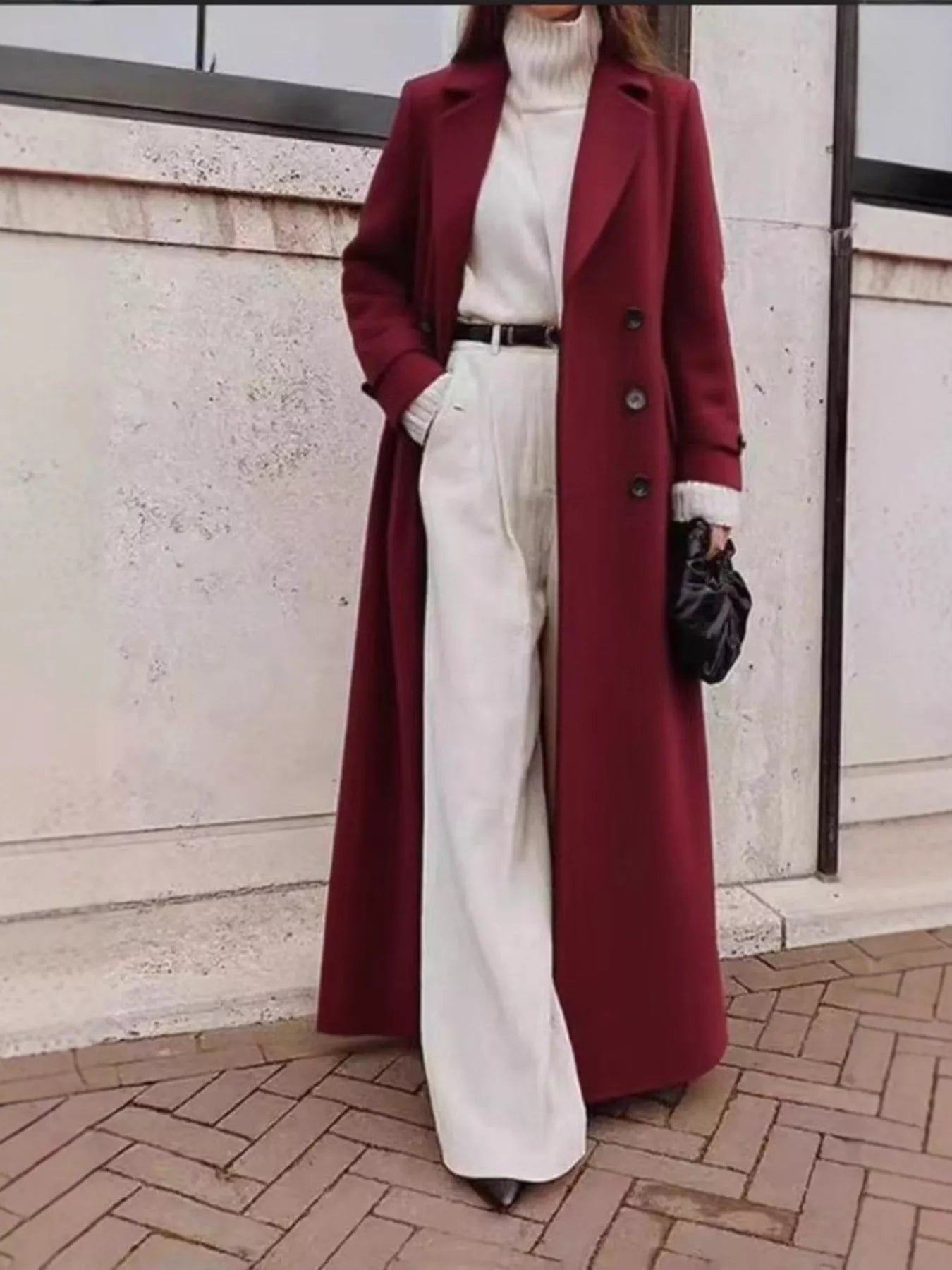 Double Breasted Longline Overcoat worn with a turtleneck and wide-leg pants, showcasing a chic winter outfit.