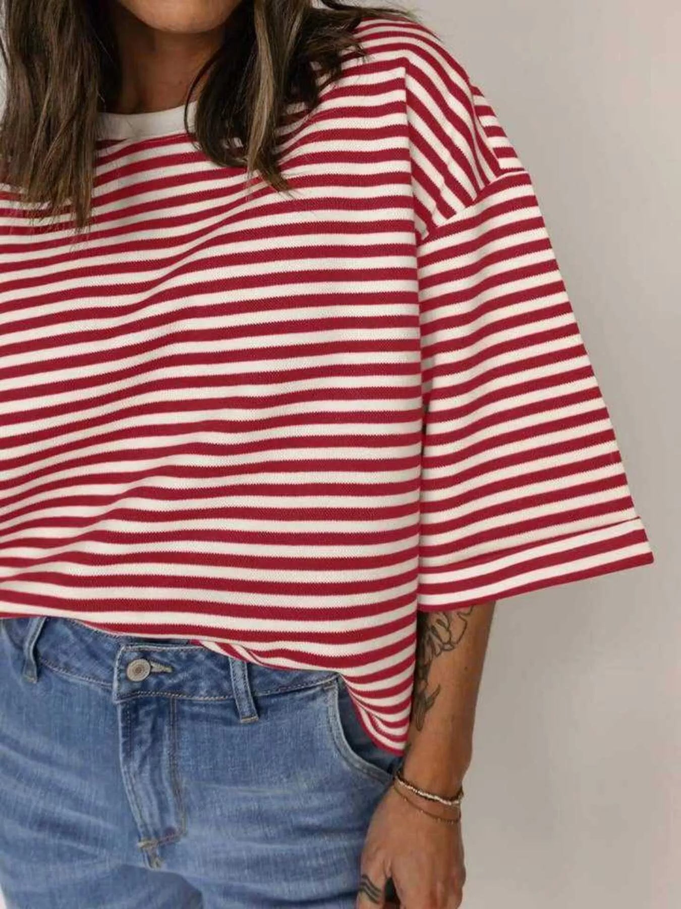 Striped Back Bow Tie T-Shirt in red and white stripes, perfect for casual everyday style.