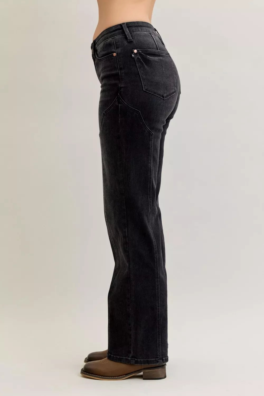 Judy Blue Mid Rise Straight Western Seam Jeans shown from the side, featuring a mid-rise waist and straight-leg cut.