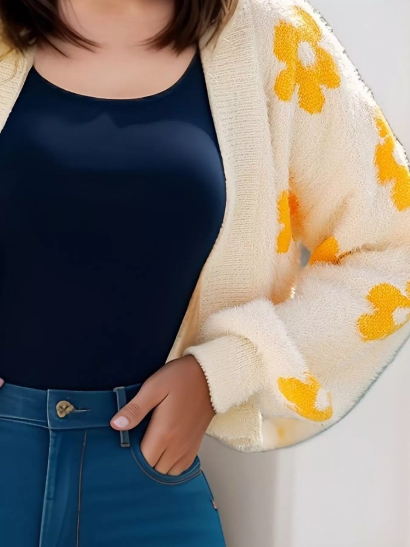 Floral Open Front Cardigan for Women with yellow flowers, paired with a navy top and blue jeans.