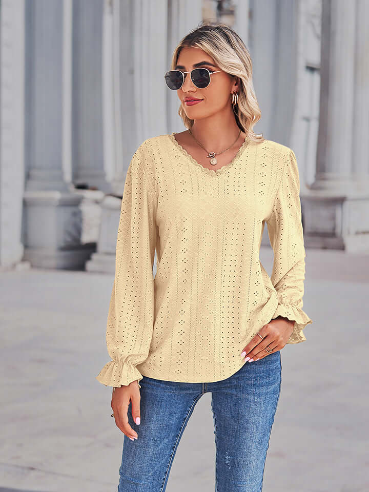 Model wearing Eyelet V-Neck Flounce Sleeve Blouse in yellow, showcasing flounce sleeves and a stylish V-neckline.