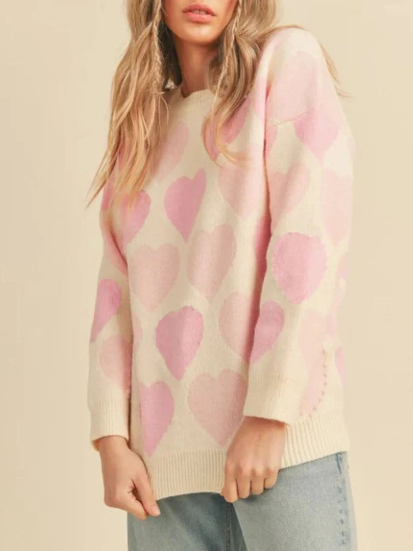 Heart Ribbed Hem Long Sleeve Sweater in pink with heart patterns, ideal for everyday style and comfort.
