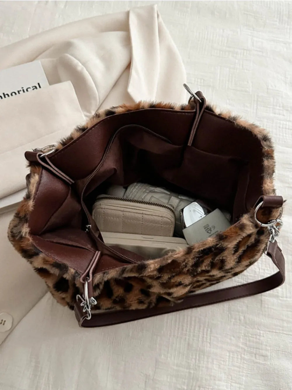 Inside view of Faux Fur Leopard Shoulder Bag showcasing its spacious interior and elegant design.