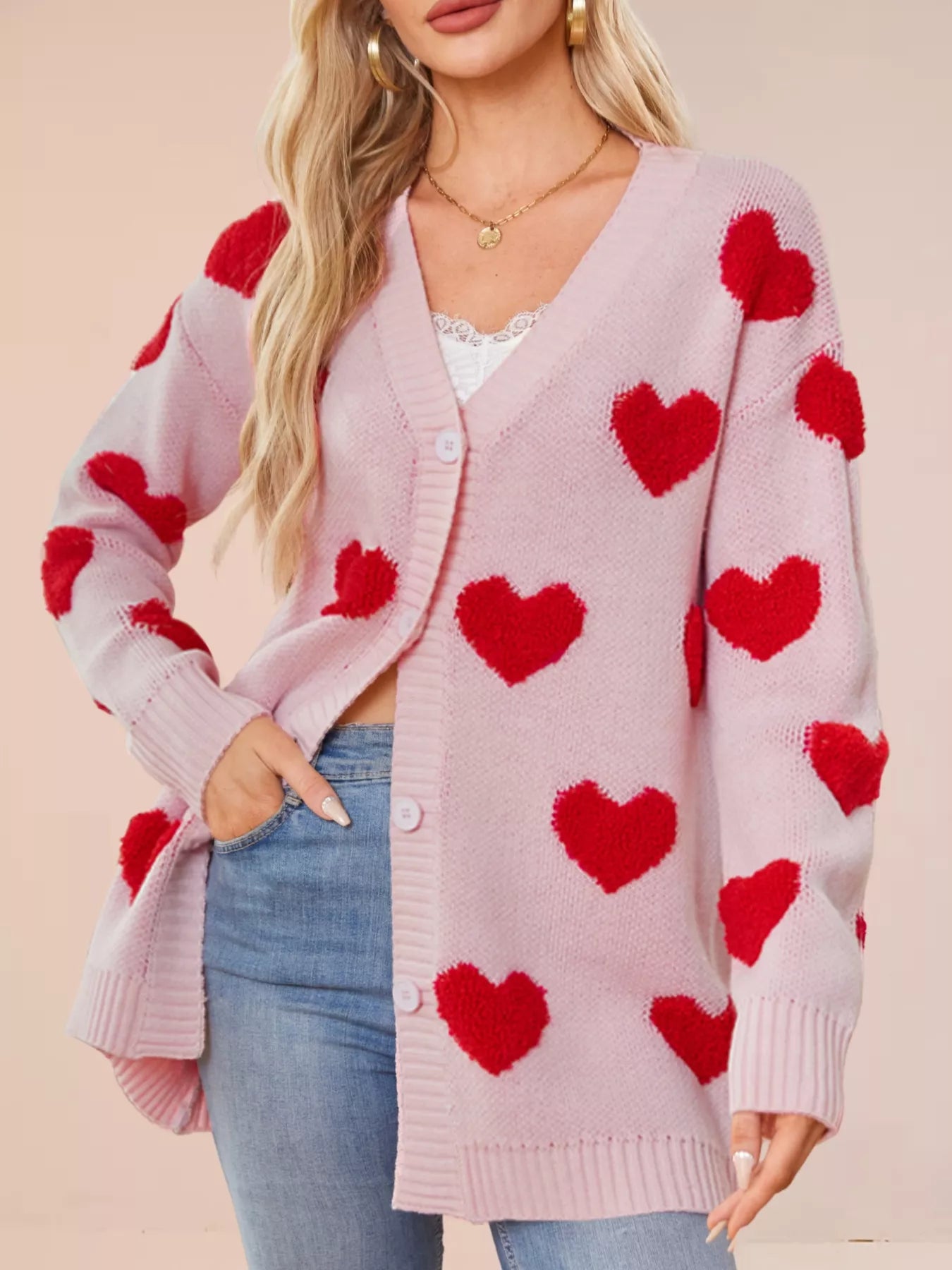 Heart Pattern Knit Button Up Cardigan for Women in pink with red hearts, featuring ribbed and buttoned design.