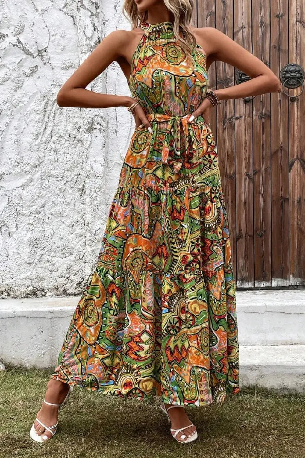 Tied Floral Sleeveless Dress featuring a colorful patterned design, perfect for summer outings and casual wear.