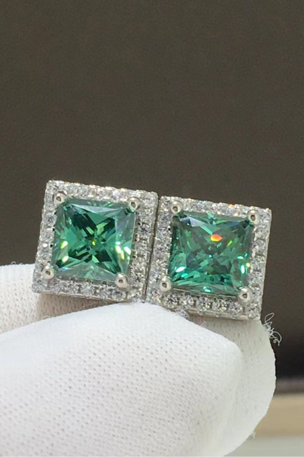 2 Carat Moissanite Square Stud Earrings in modern design, featuring geometric green stones and sparkling zircon accents.