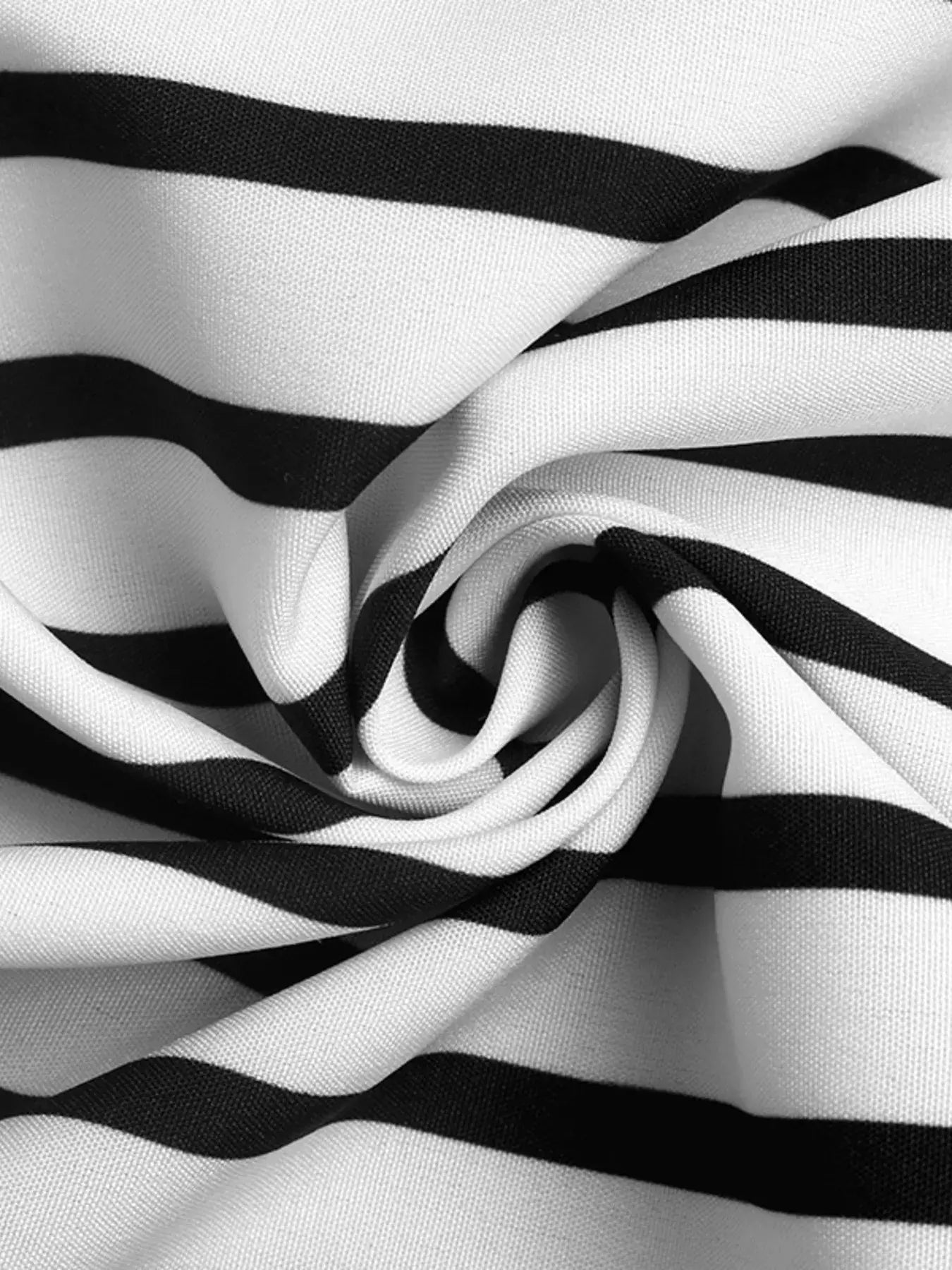 Striped Color Block Surplice Shirt fabric close-up with black and white stripes.
