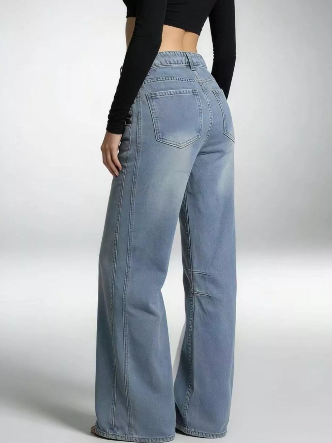 Wide Leg Wash Jeans with Buttoned Pocketed Design, showcasing a rear view of the stylish jeans.