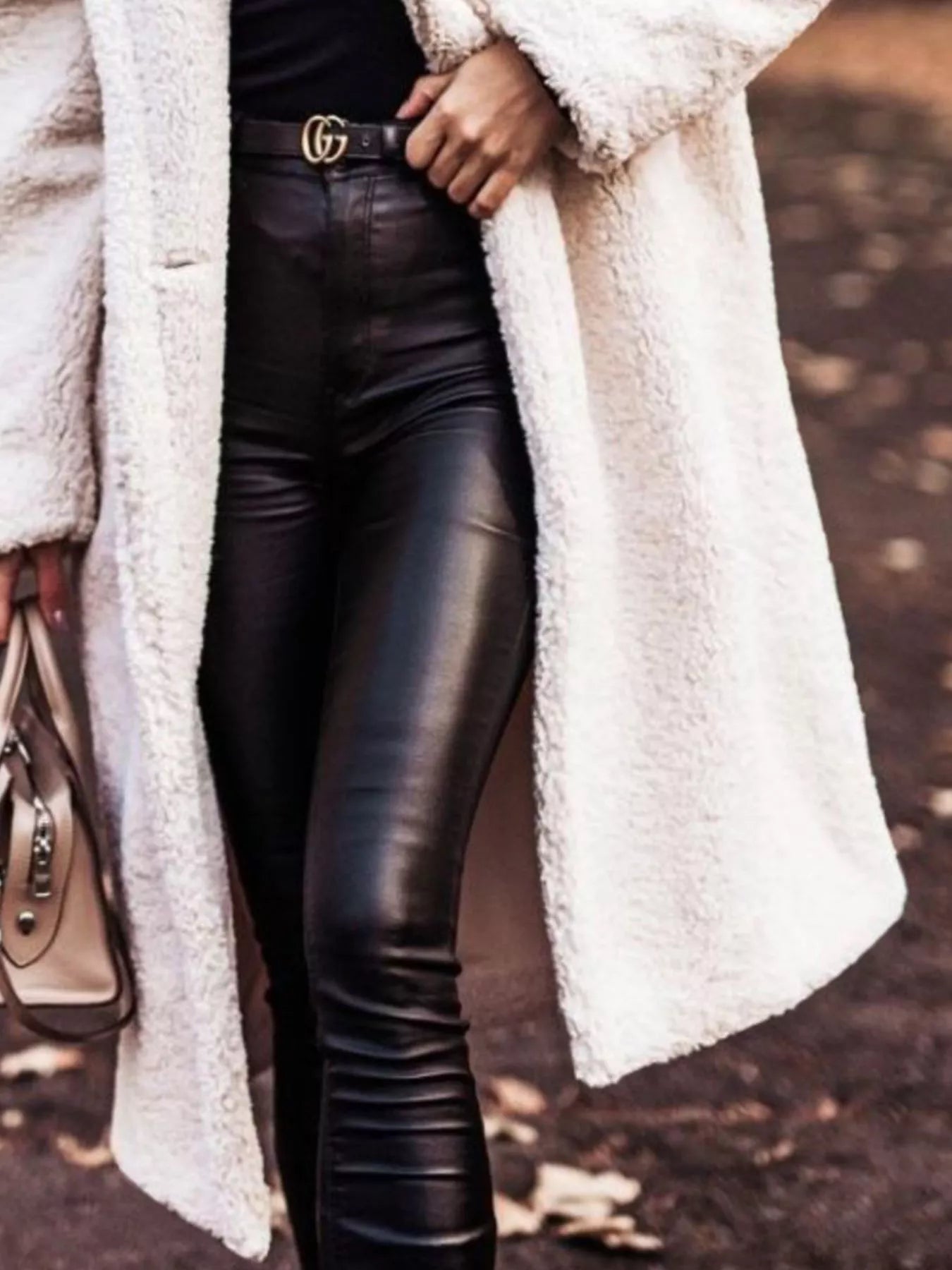 Teddy Bear Hooded Longline Outerwear styled with black leather pants for a chic and cozy look.