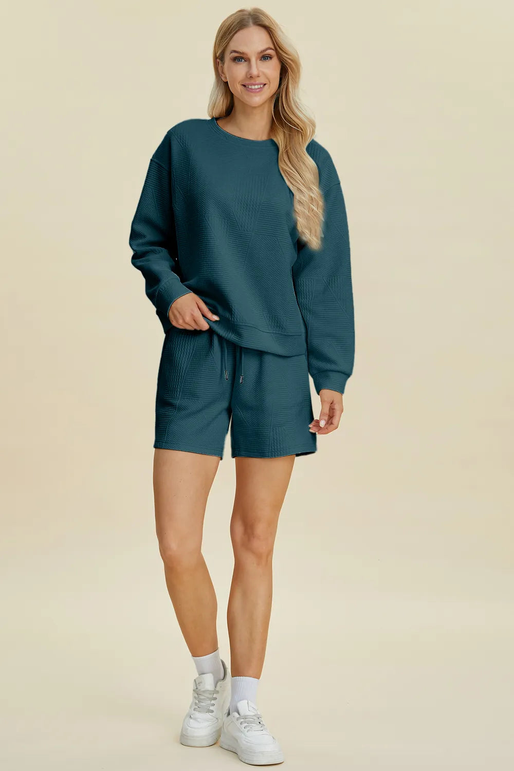 Double Take Full Size Texture Round Neck Top and Shorts Set in teal color, featuring a round neck top and drawstring shorts.