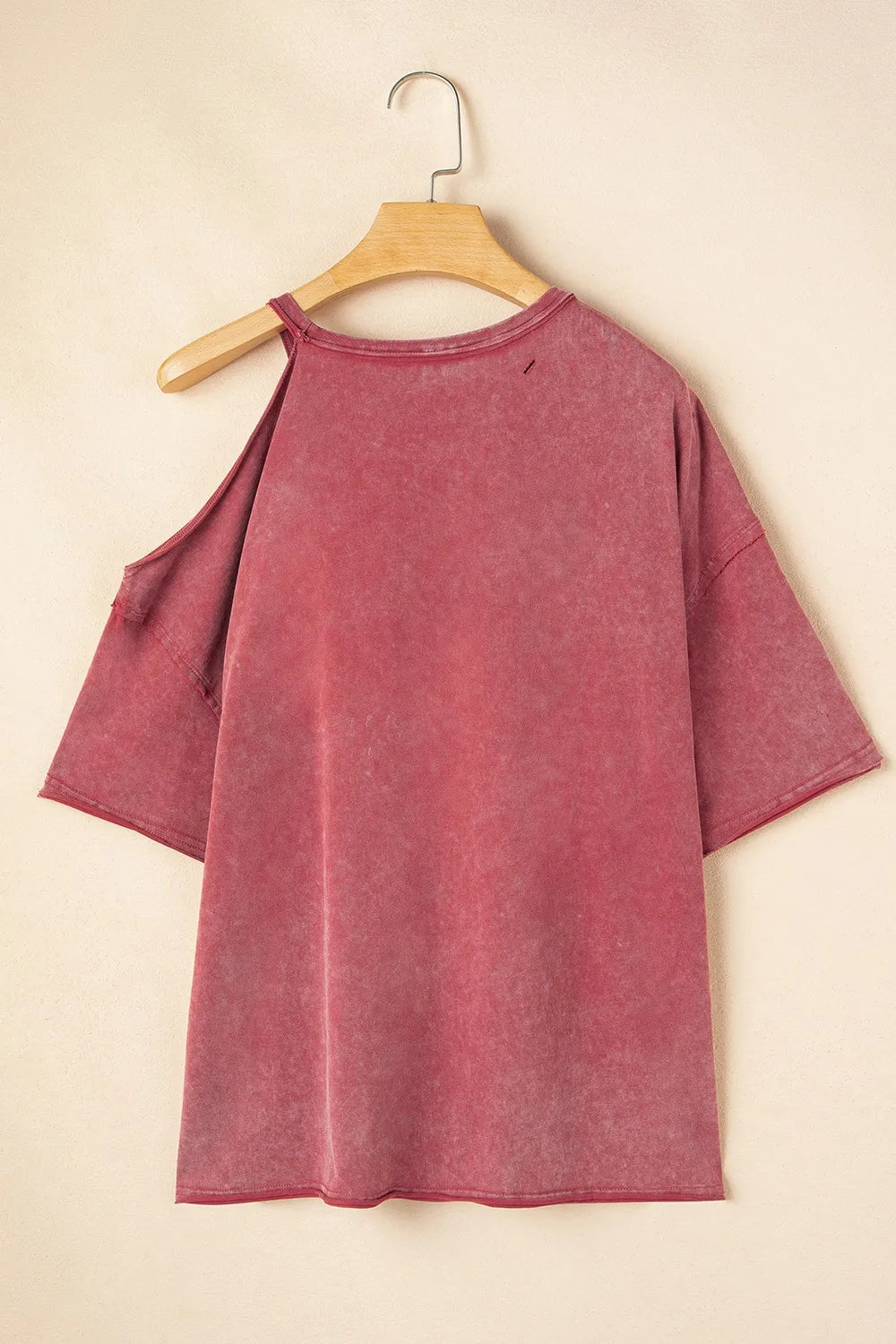 One Shoulder Half Sleeve Oversized Tunic T Shirt for Women in pink with distressed cutout detail and slightly stretchy fabric.