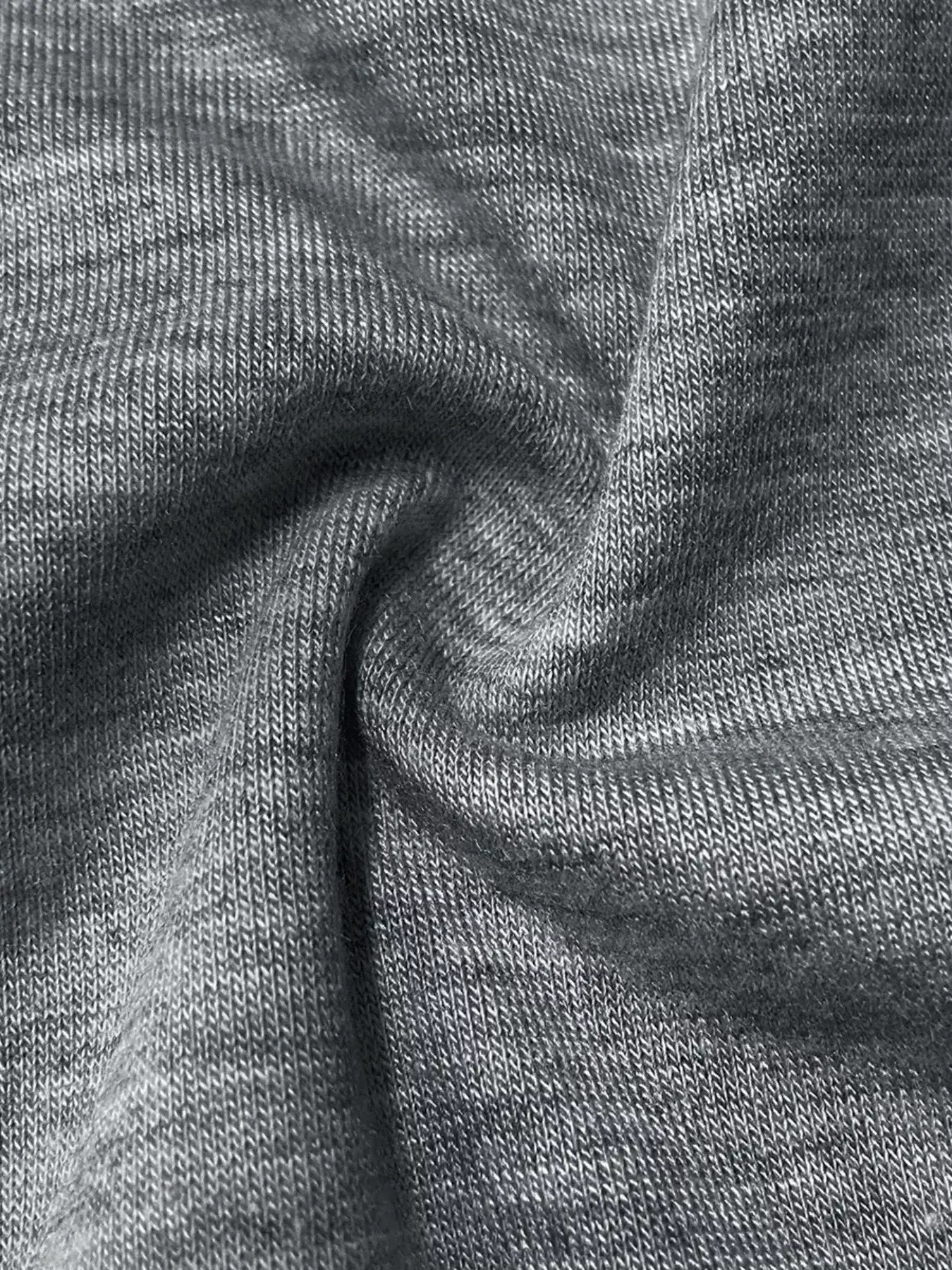 Close-up of soft fabric texture for Long Sleeve Drawstring Romper, highlighting comfort and quality.