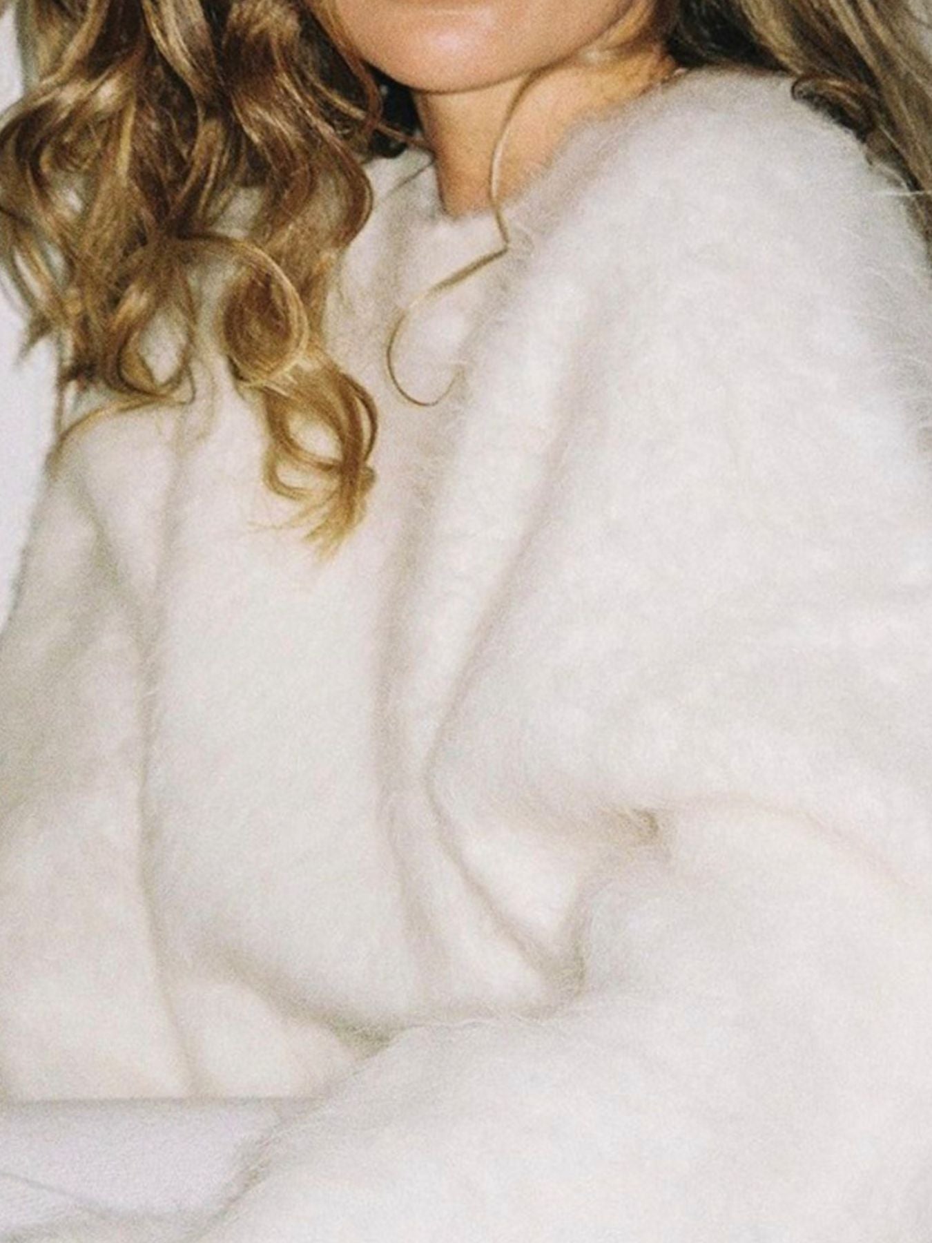 Fuzzy Round Neck Long Sleeve Sweater cozy pullover for women, featuring a soft and light material in white.