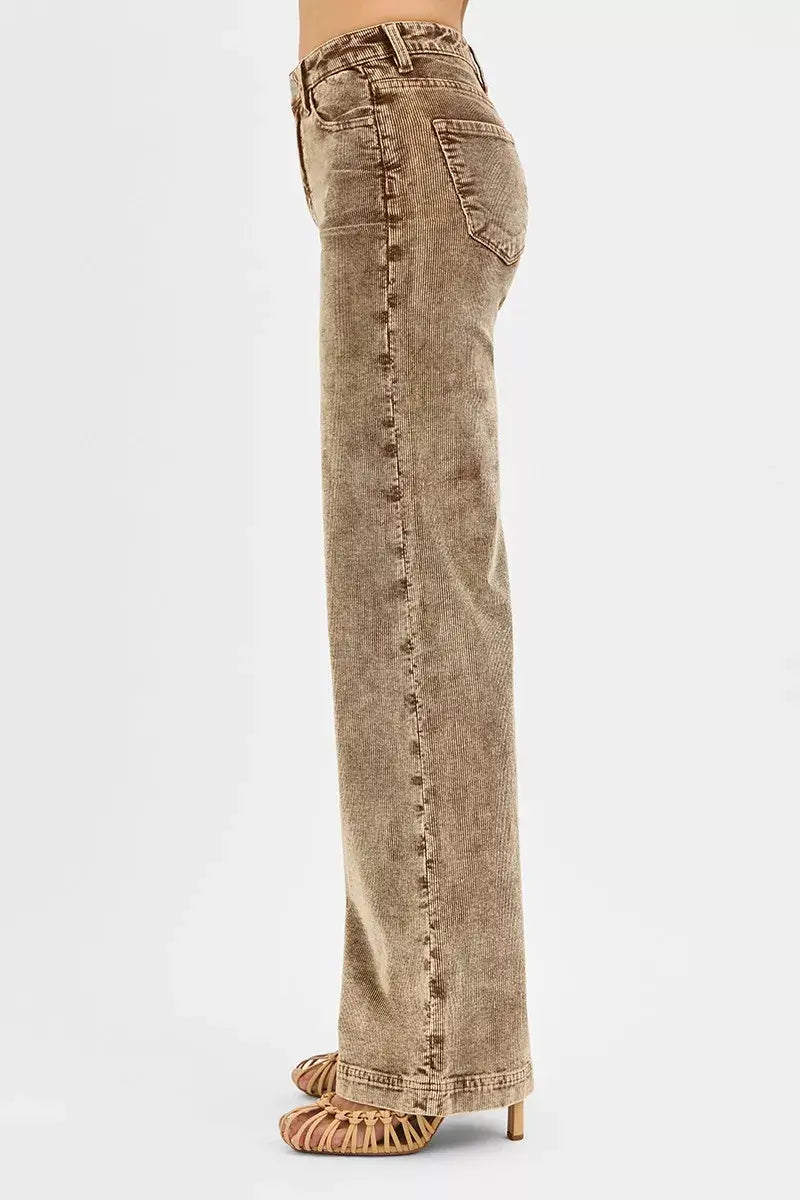 Side view of RISEN high rise wide leg corduroy jeans showcasing stylish retro design and flattering silhouette.