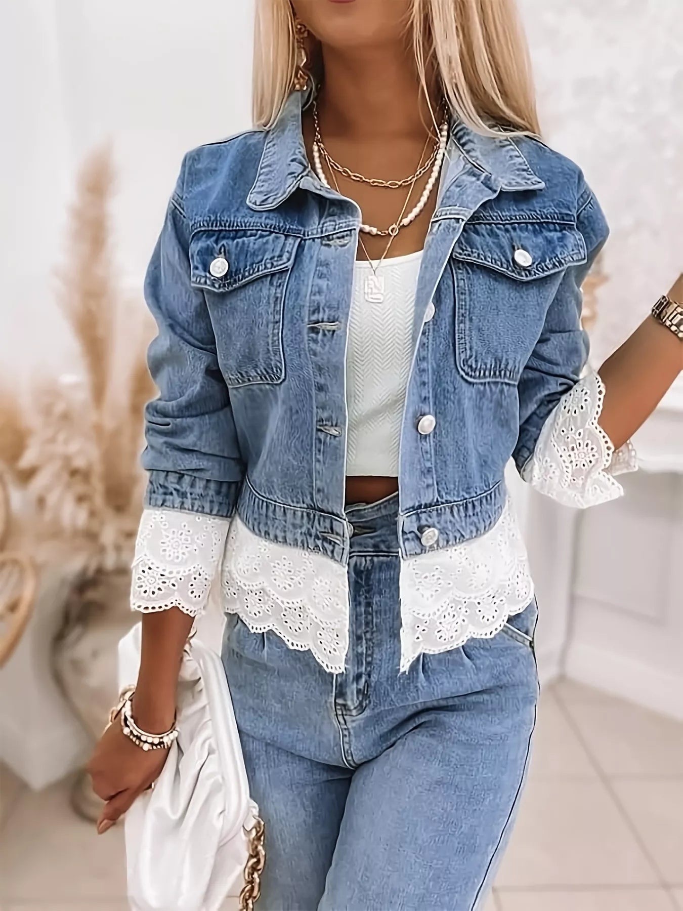 Cropped Denim Jacket with Lace Trim styled with chic outfit in casual setting.