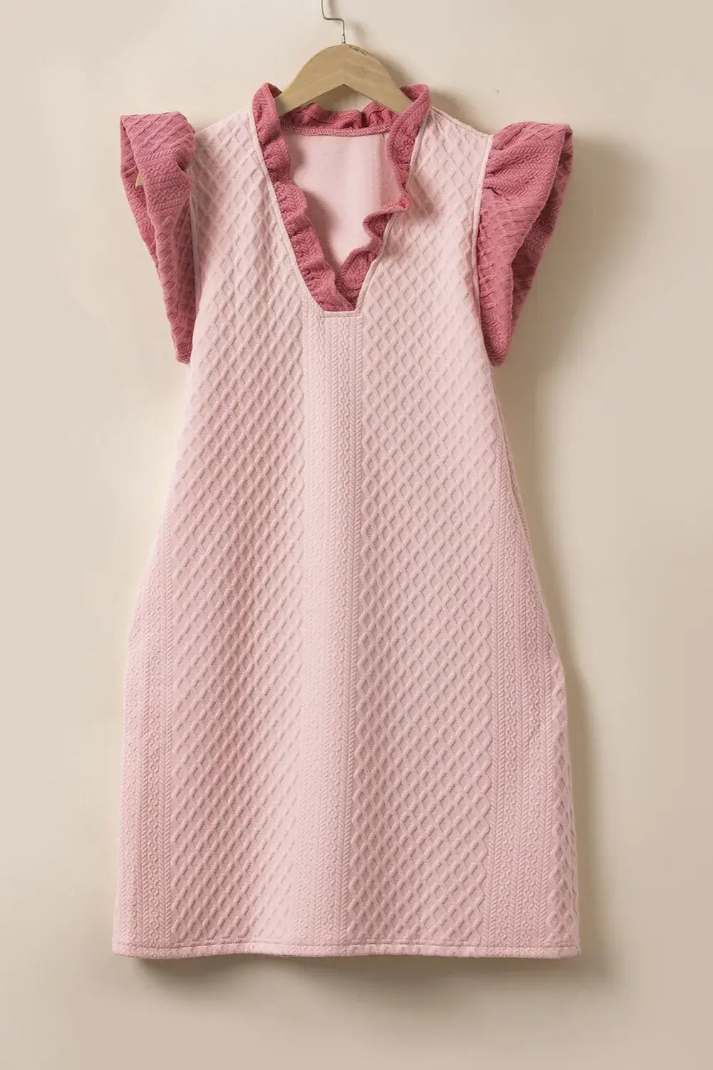 Ruffled V-Neck Cap Sleeve Mini Dress in soft pink with textured fabric and elegant ruffled sleeves.