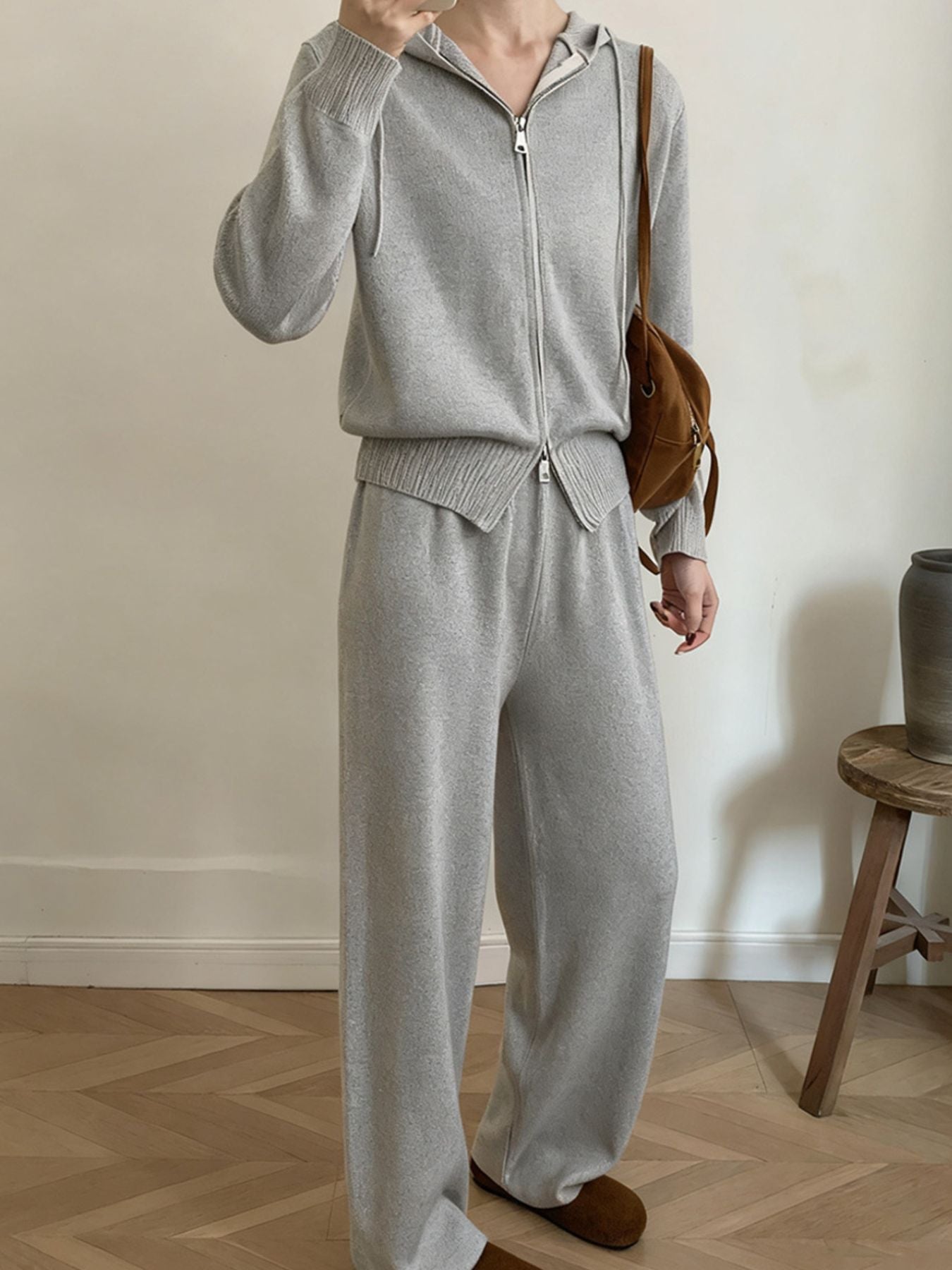 Model wearing a Zip Up Cardigan and Wide Leg Pants Knit Set in gray, showcasing a stylish two-piece outfit.