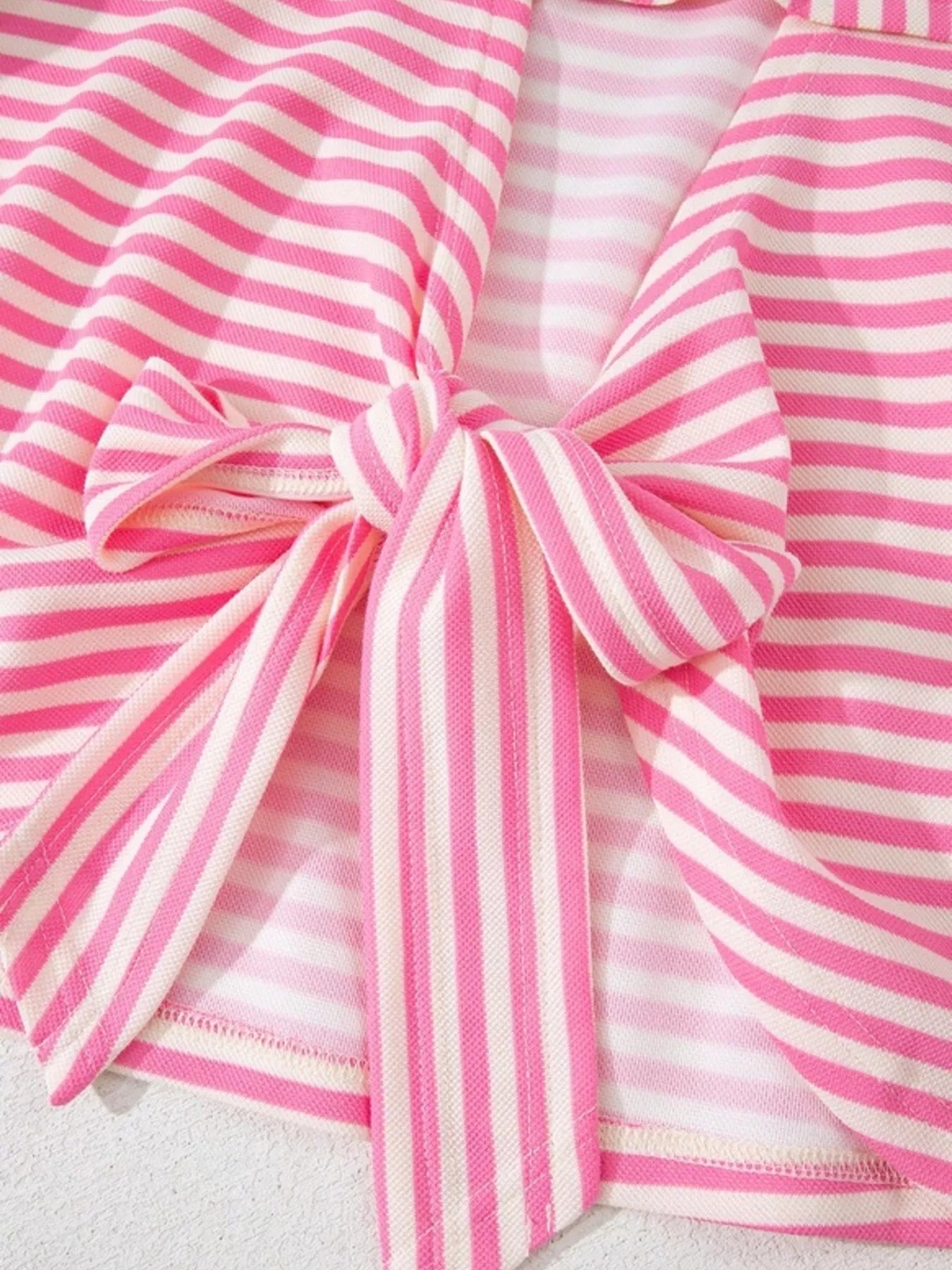 Striped Back Bow Tie T-Shirt features tie detail and pink stripes for casual everyday style.