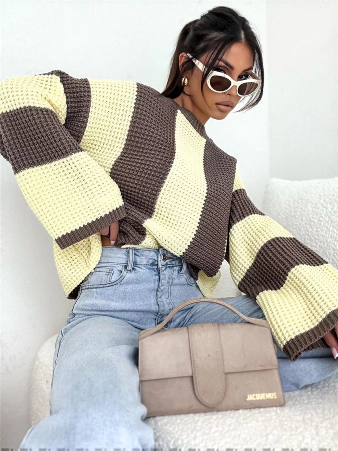 Color Block Long Sleeve Sweater in oversized knit style with brown and yellow stripes, paired with high-waisted jeans.