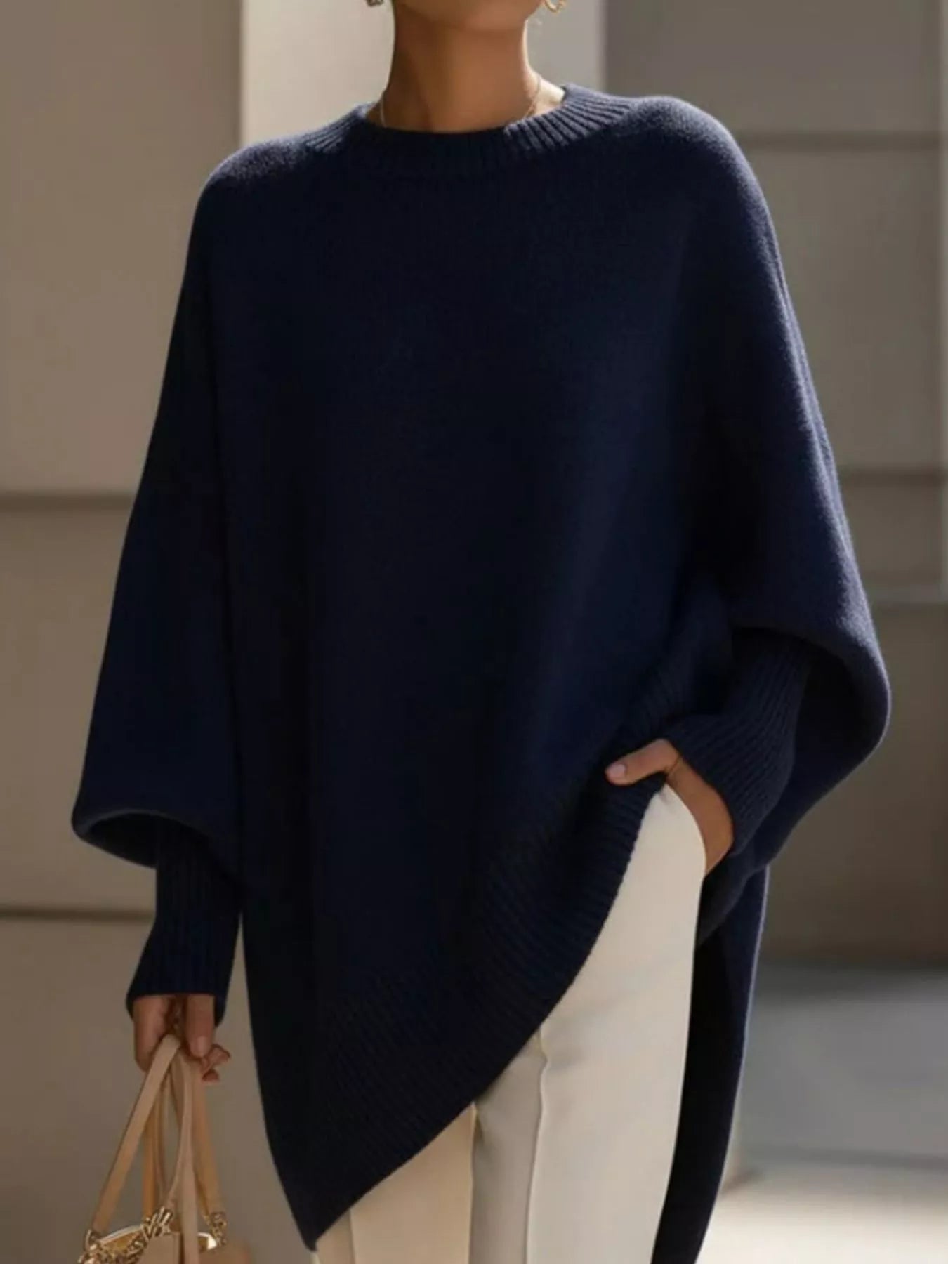 Oversized Batwing Sleeve Knit Sweater for Women in navy blue, featuring ribbed texture and relaxed fit.